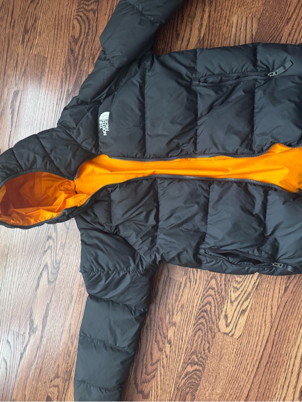 The North Face Black Kids Puffer Jacket with Orange Lining